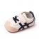 Adidasi ivoire cu dungi negre pentru baietei (marime disponibila: 3-6 luni